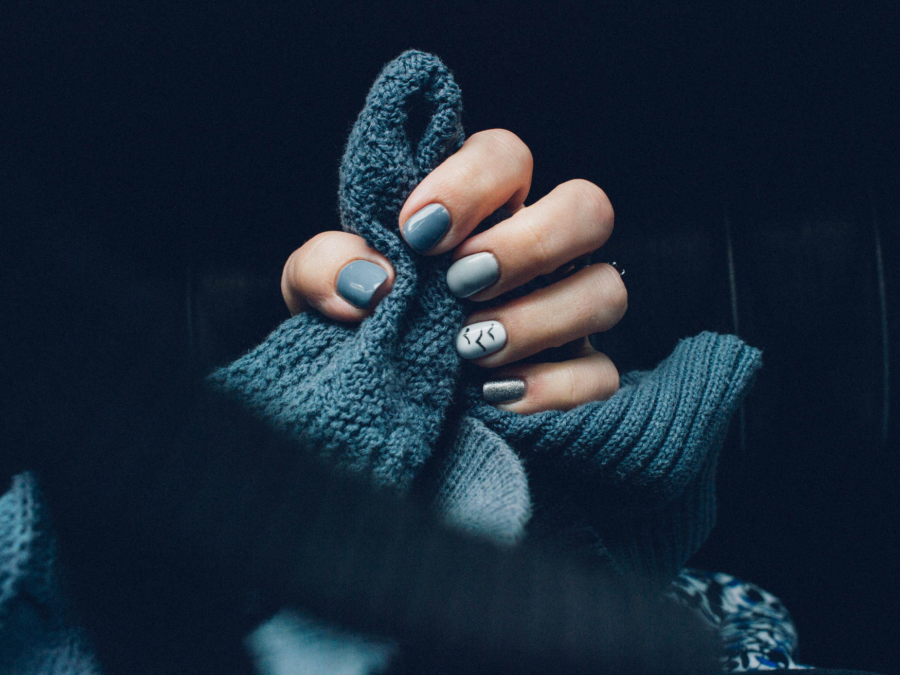 Blue Knitted Clothing And Nails